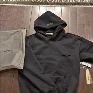 New Essentials Black Pullover Hoodie with dust bag
